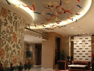 Haishu Taosheng Yiju Business Hotel Ningbo Exterior photo